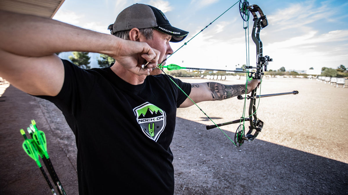 John Dudley shooting a compound bow